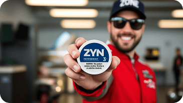 man holding nicotine pouches